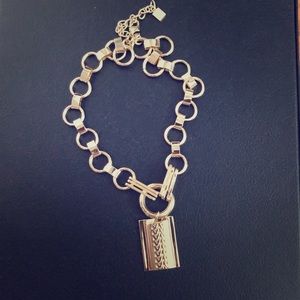 Gold necklace with square pendant